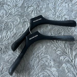 2 wooden Balenciaga hangers